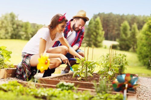 Gardener carrying out safe site preparation