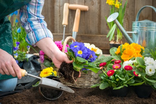 Trained South Tottenham gardeners using PPE on a garden job